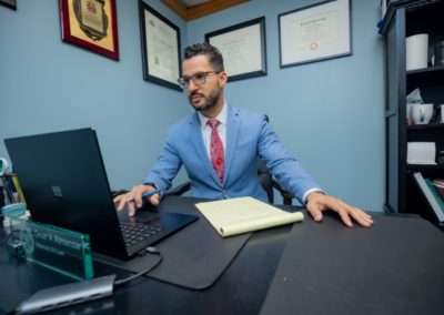 Personal Injury Lawyer Omar Almanzar-Paramio at work doing a virtual visit